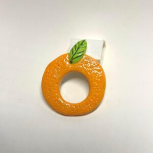 orange brooch