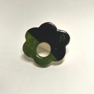 green black brooch