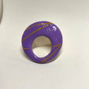 purple brooch